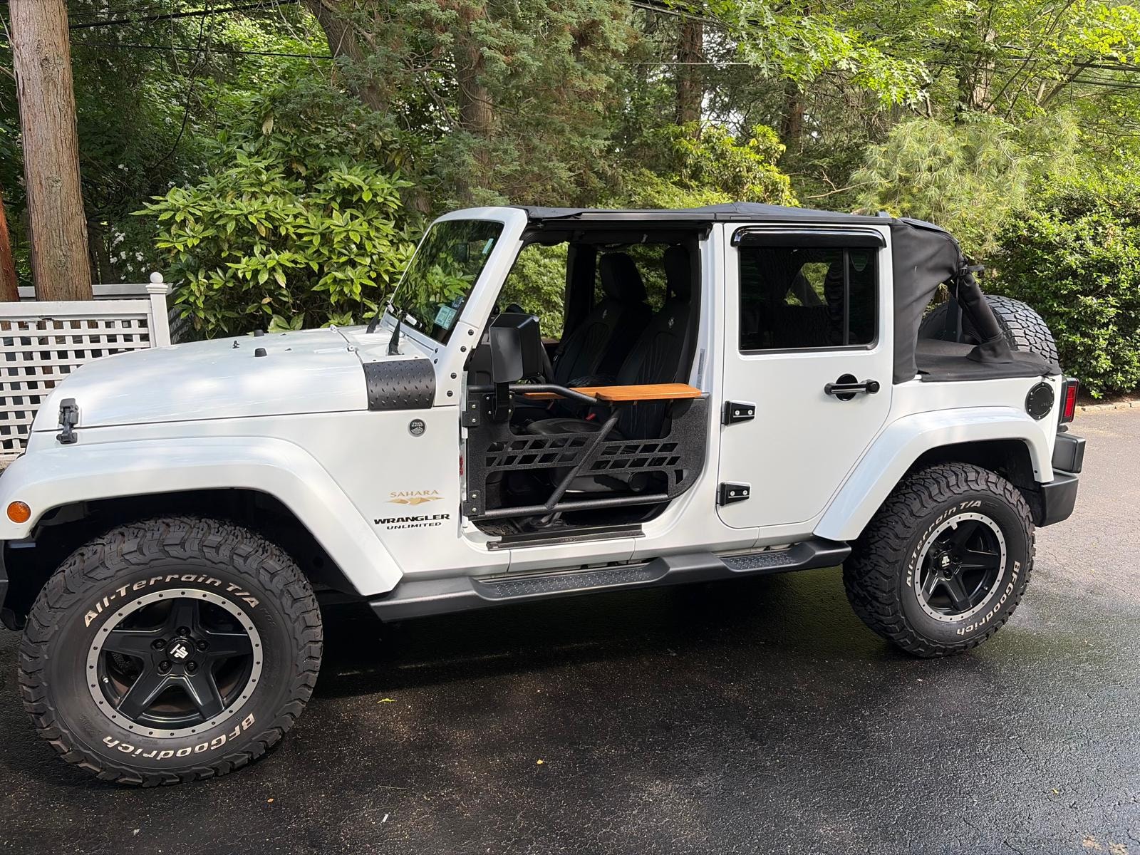 Freedom Rests armrest on a Jeep tube door in the field
